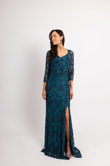 Φόρεμα maxi παγιέτα με ιδιαίτερη λαιμόκοψη και διαφάνεια στα μανίκια πετρόλ