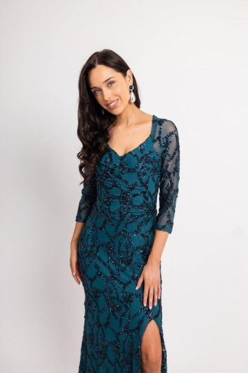 Φόρεμα maxi παγιέτα με ιδιαίτερη λαιμόκοψη και διαφάνεια στα μανίκια πετρόλ - 